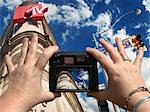 Hands Holding Digital Camera Photographing Masonic Temple, Toronto, Ontario