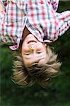 Boy Hanging Upside Down, Salzburger Land, Austria