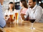 Friends Having Drinks at Wine Bar, Toronto, Ontario, Canada