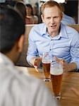 Men Having Drinks at Wine Bar, Toronto, Ontario, Canada