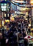 High angle view of crowd walking on a street decorated for Christmas, Grafton Street, Dublin, Republic Of Ireland