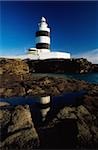 Hook Head, County Wexford, Ireland; Lighthouse on rocky coast