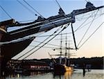 Tall Ships;  Bow of a ship with another tall ship in the distance