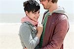 Young couple at the coast