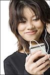 Woman with mp3 player smiling