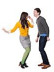 Young couple dancing, studio shot