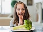 USA, Utah, Alpine, happy girl (8-9) with meal