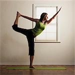 USA, Utah, Orem, young woman doing yoga