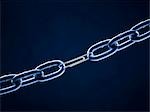 Chain linked with paper clip against blue background