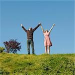 USA, California, San Francisco, young couple holding hands on hill