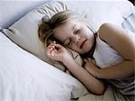 USA, Utah, Provo, Girl (4-5) asleep in bed