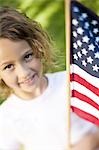 Girl holding US flag