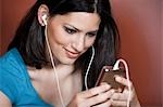 Woman listening to MP3 player