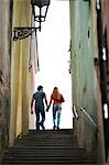 Couple walking and holding hands