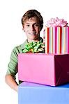 Boy carrying presents
