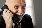 Closeup of businessman on telephone