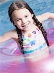 Smiling girl in pool