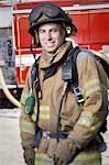 Fire fighter in uniform with Crossed Arms