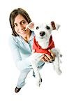 Woman with white dog in hooded sweatshirt