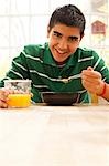 Boy eating breakfast