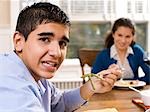 Boy eating green beans