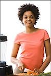 Woman preparing food in kitchen