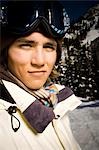 Young adult man outside in the snow