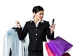 Frau mit Einkaufstüten und Handy