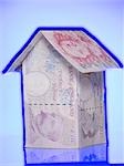 House made of paper currency