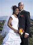 Portrait of a newlywed couple smiling together