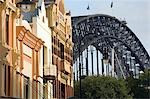 Historic architecture at The Rocks with a backdrop of the Sydney Harbour Bridge