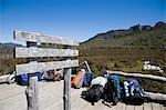 Hikers on the Overland Track leave their heavy packs behind before setting off on the ascent of Mount Ossa,Tasmania's highest mountain at 1614m