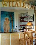 The bar in Little Whale House with its elegant painted ceiling and mural