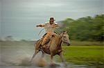 Traditional Pantanal Cowboys,Peao Pantaneiro,at working farm and wildlife lodge Pousada Xaraes set in the UNESCO Pantanal wetlands of the Mato Grosso do Sur region of Brazil