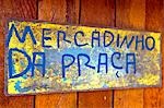 Brazil,Bahia,Boipeba Island. A sign for 'Mercadinho da Praca'.