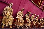 A row of golden Buddha statues at the Ten Thousand Buddhas Monastery near Sha Tin in the New Territories Hong Kong.