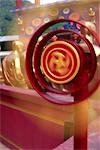 A Buddhist wheel of life is spun at the Ten Thousand Buddhas Monastery near Sha Tin in the New Territories,Hong Kong