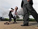 businessman on skateboard