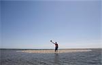 Man standing on small island