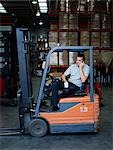 A warehouse manager takes a tea break