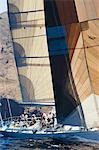 Sailors working on sailboat