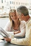 Tourist Couple in Cafe