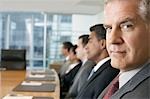 Businessman at conference meeting, portrait