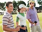 Three young golfers on court