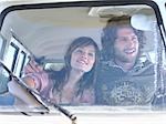 Couple Sitting in camper van, view through windscreen