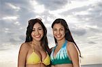 Three teenage girls (16-17) wearing bikinis, standing on beach, portrait -  Stock Photo - Masterfile - Premium Royalty-Free, Code: 693-03305821