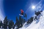 Person on snowboard, jumping