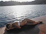 Woman Sunbathing on Yacht