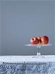 Three apples on fruit platter on table