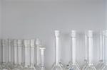 Laboratory flasks on shelf